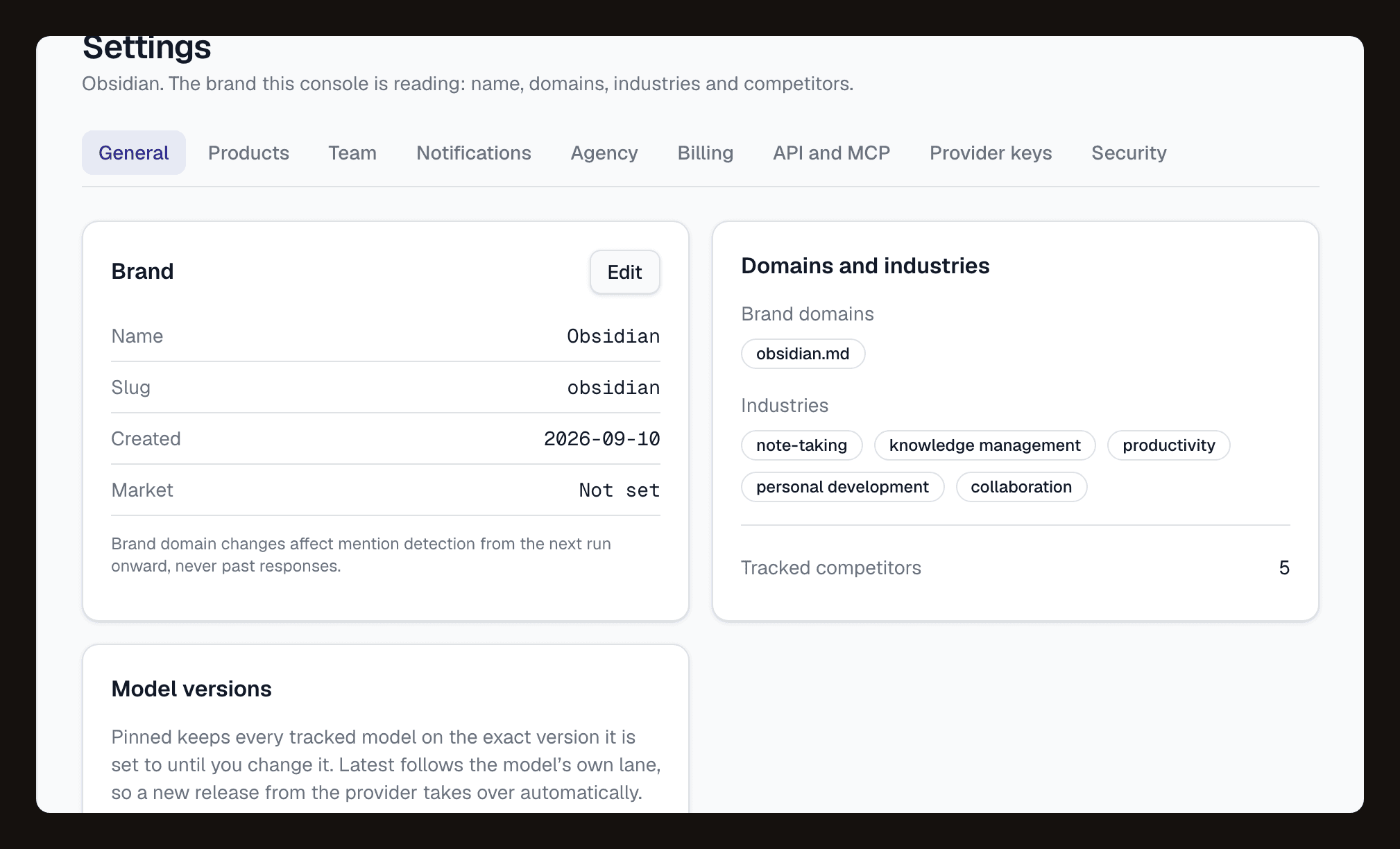 The brand settings tab: name, domains and industries, and the model versions section where pinned and latest are chosen.